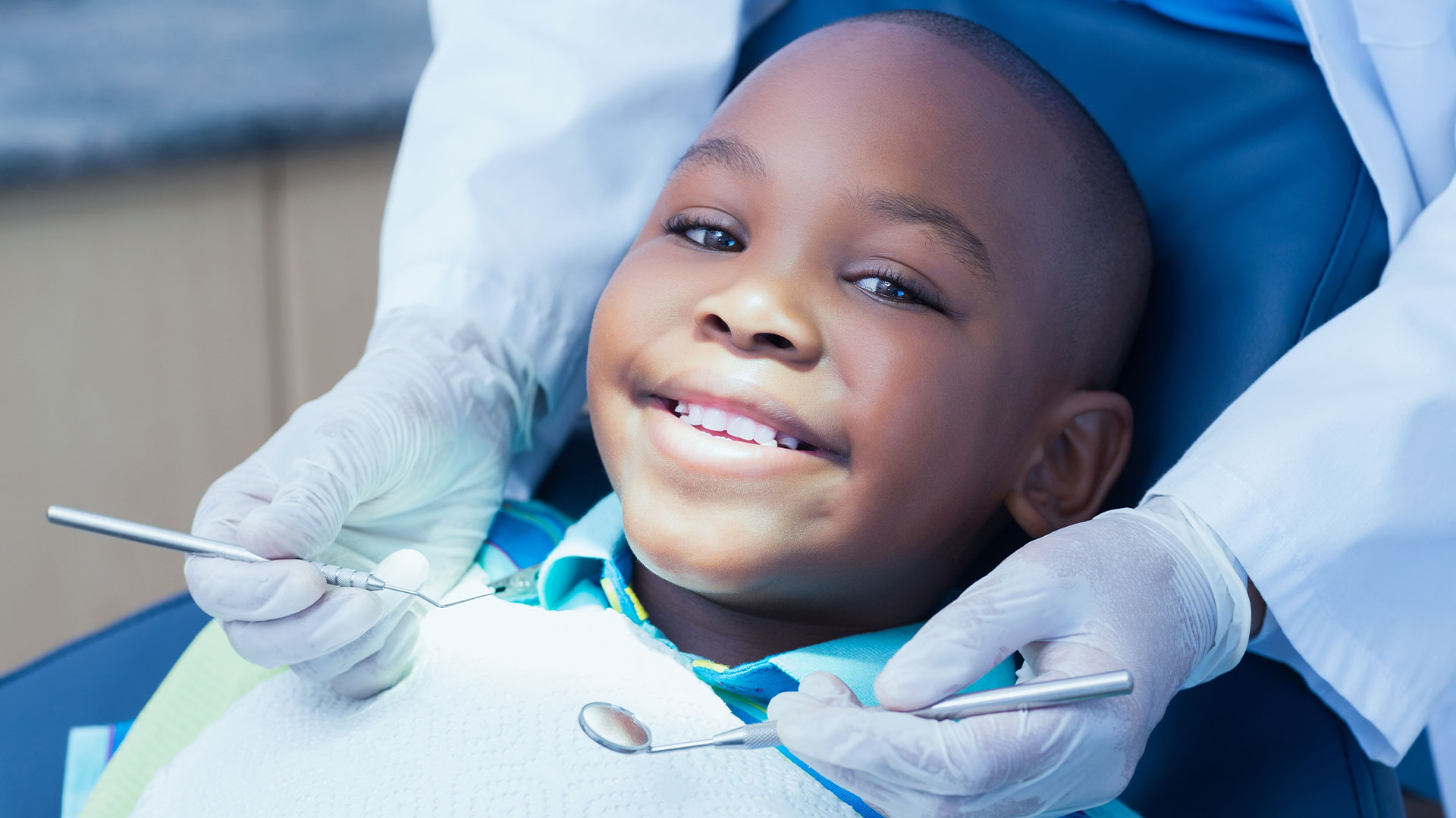 The Kids  Dentist Tucson | Extractions, White Fillings and Fluoride Treatment